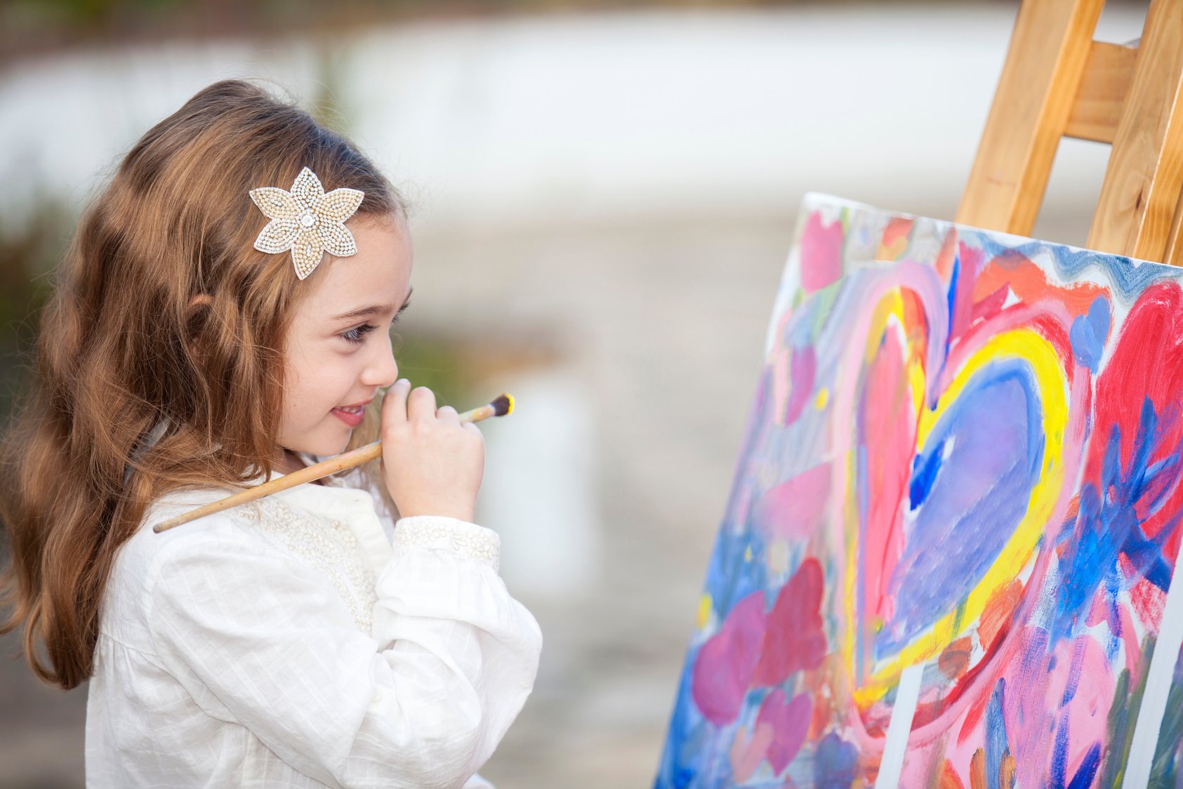 Little artist creating a painting